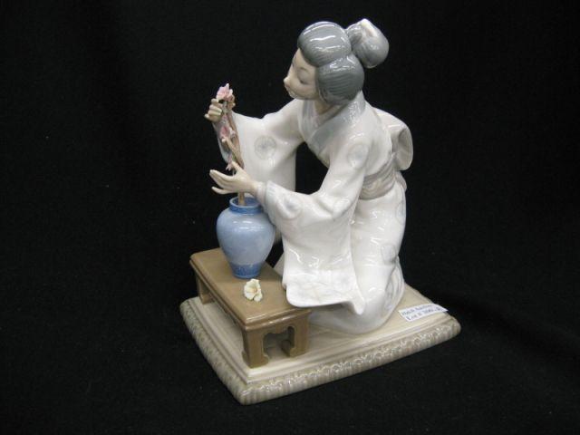 Appraisal: Lladro Porcelain Figurine of Japanese Lady arranging flowers excellent