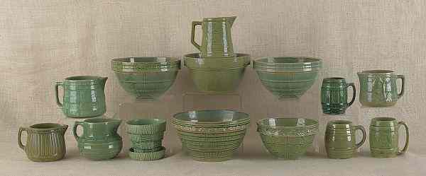 Appraisal: Fourteen pottery mixing bowls mugs and pitchers early th c