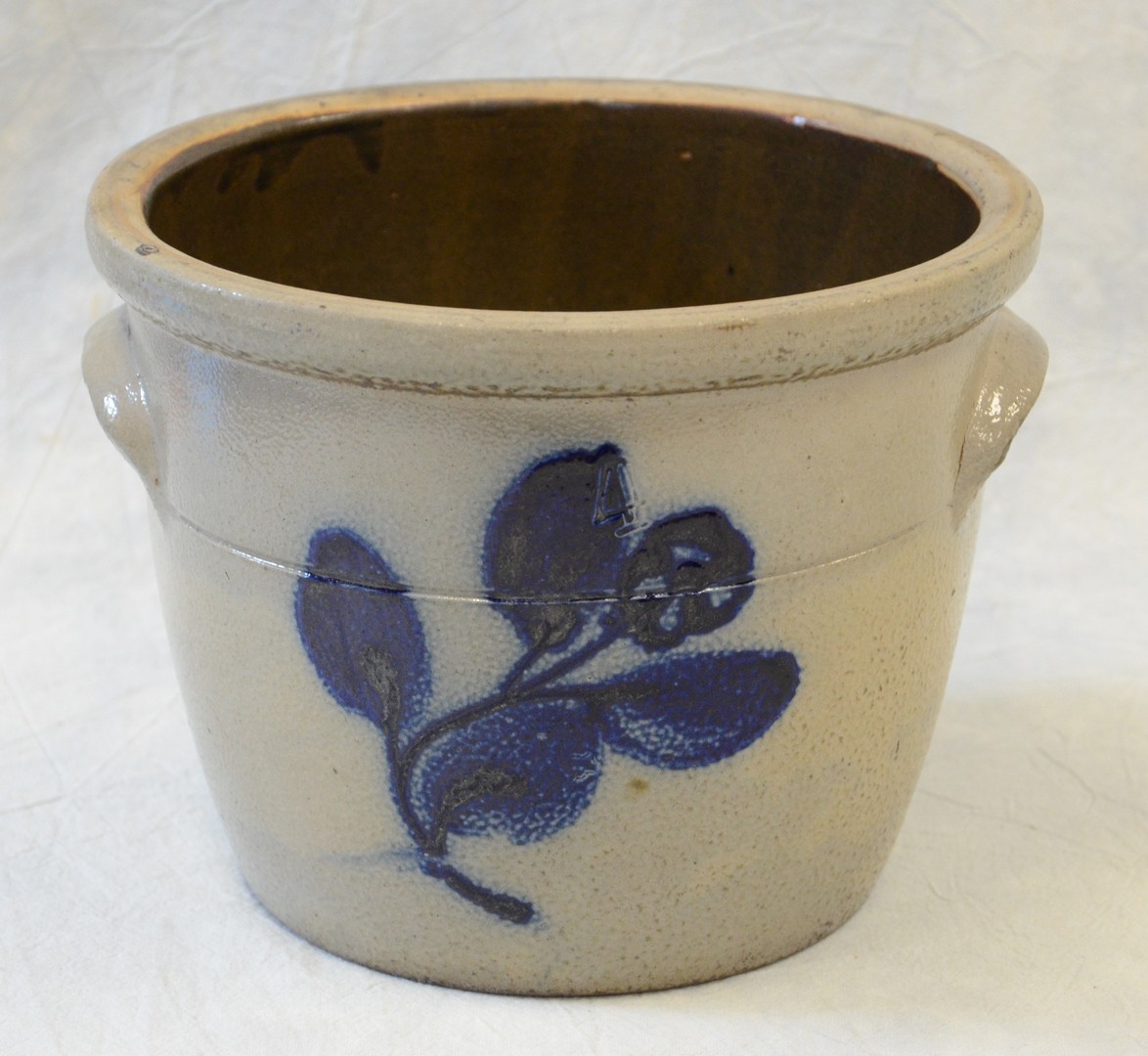 Appraisal: Stoneware double eared crock cobalt blue floral decoration c dia