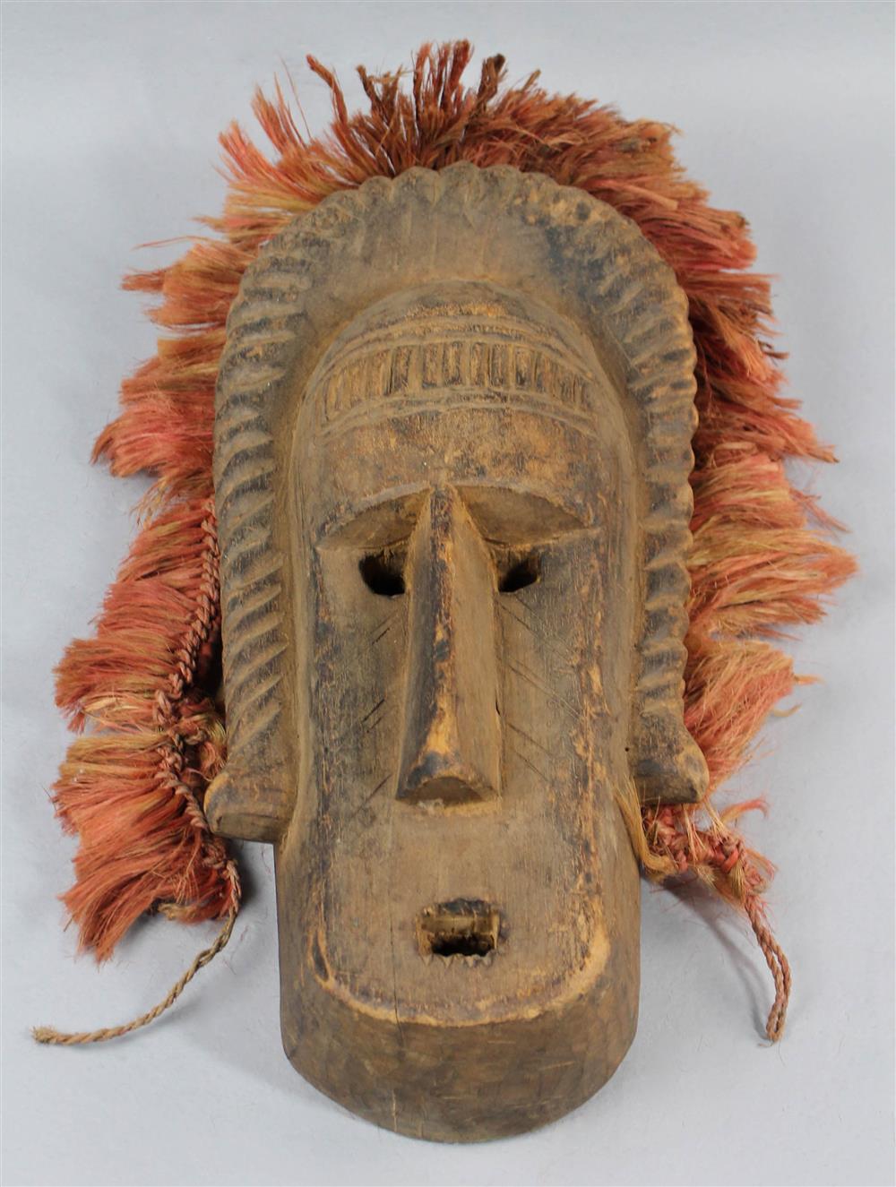 Appraisal: AFRICA CARVED WOOD MASK WITH RAFFIA TRIM POSSIBLY MALI Bamana