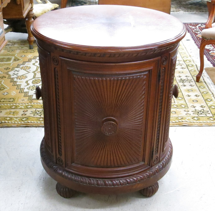 Appraisal: A ROUND CABINET DRUM TABLE unknown maker recent production a