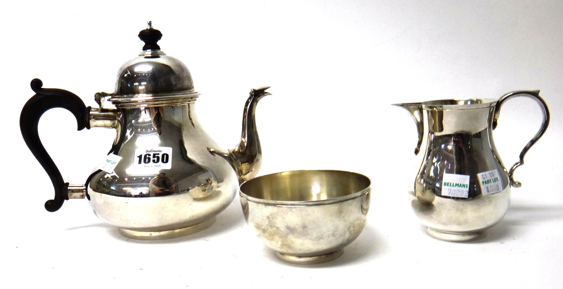 Appraisal: A silver three piece tea set comprising a teapot a