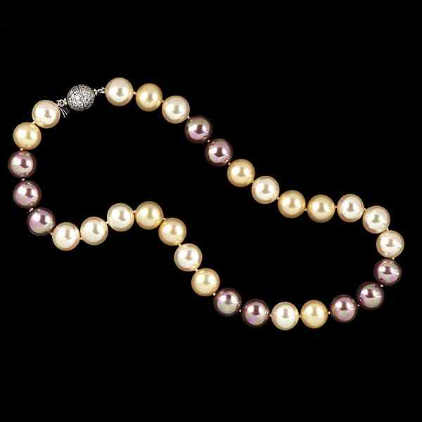 Appraisal: Mauve and Champagne Majorca Pearls Organic man-made pearls made in