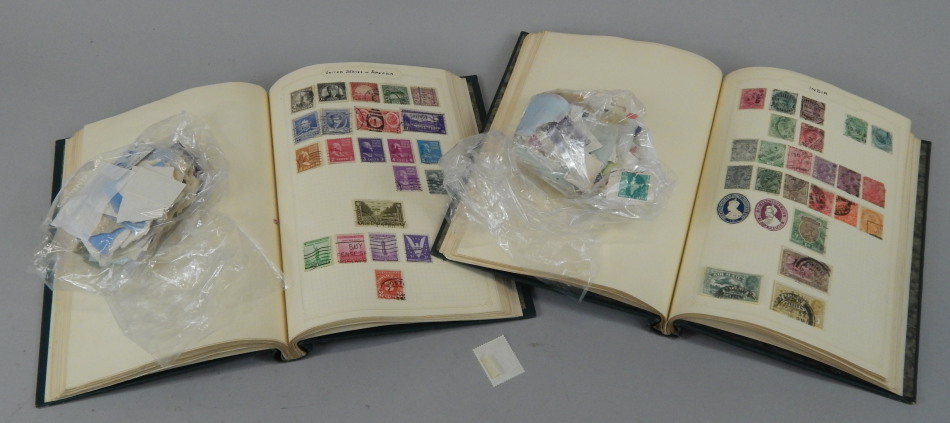 Appraisal: Two albums of world wide stamps and two bags containing