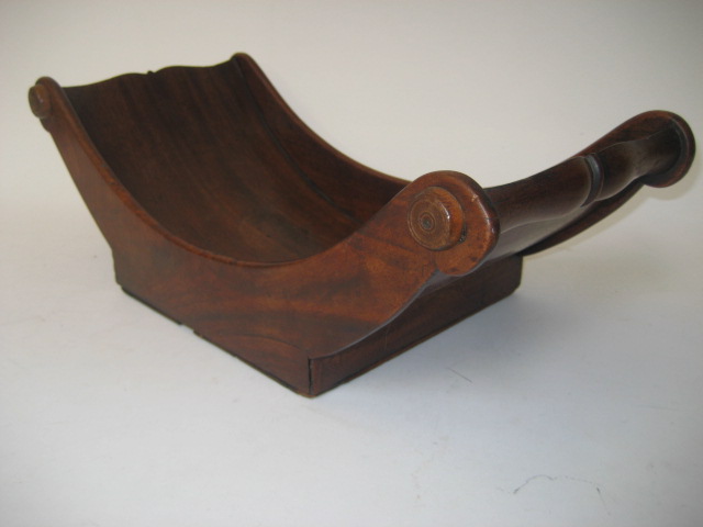 Appraisal: A MAHOGANY CHEESE COASTER early th century the raised ends