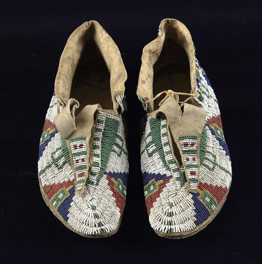 Appraisal: MOCCASINS SIOUX LATE TH CENTURY Native tanned cowhide rawhide soles