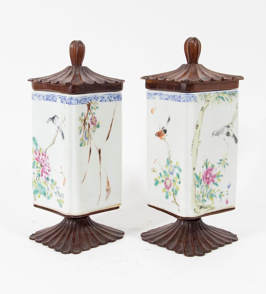 Appraisal: Pair th Century Porcelain Tea Caddies with Carved wood bases