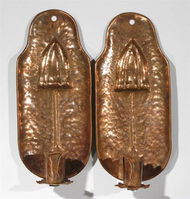 Appraisal: A pair of copper wall sconces each with curved back