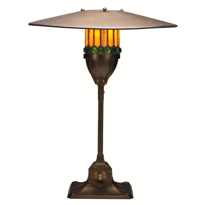 Appraisal: Austrian lamp attribution adjustable metal base holding a cylindrical leaded