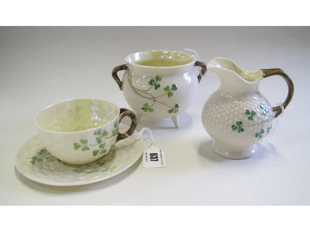 Appraisal: Belleek cup and saucer cauldron and jug all decorated with