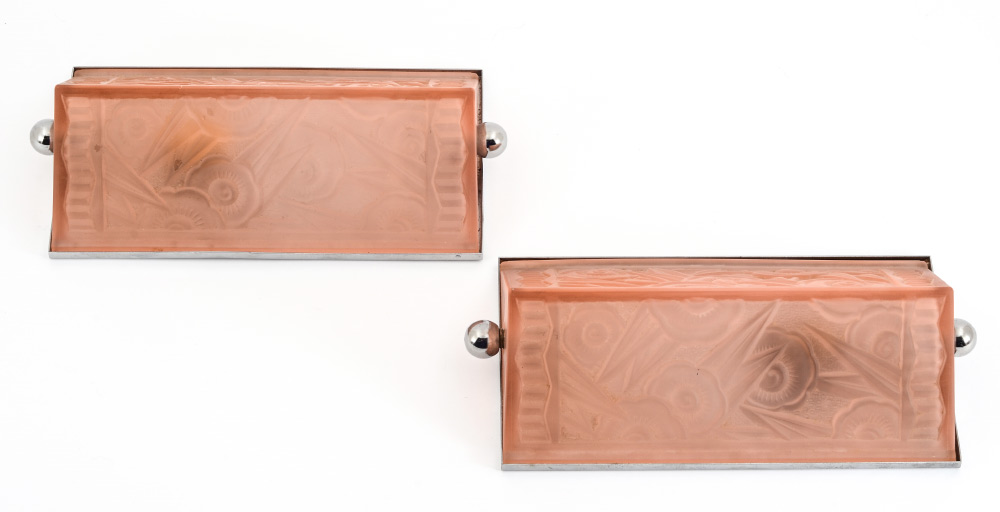 Appraisal: PAIR ART DECO SCONCES Embossed floral motif pink frosted glass