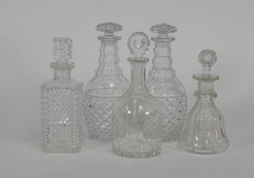 Appraisal: A pair of cut glass decanters and matching stoppers and