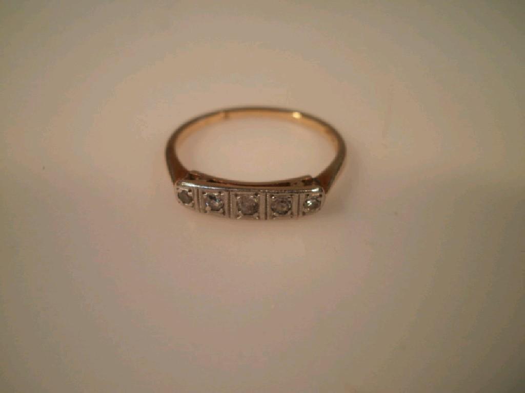 Appraisal: An Art Deco five stone in-line diamond set ring shank