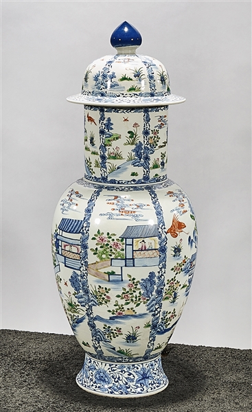 Appraisal: Tall Chinese enameled porcelain covered vase depicting various scenes of