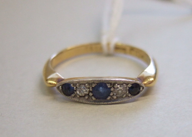 Appraisal: A gold sapphire and diamond set five stone ring mounted