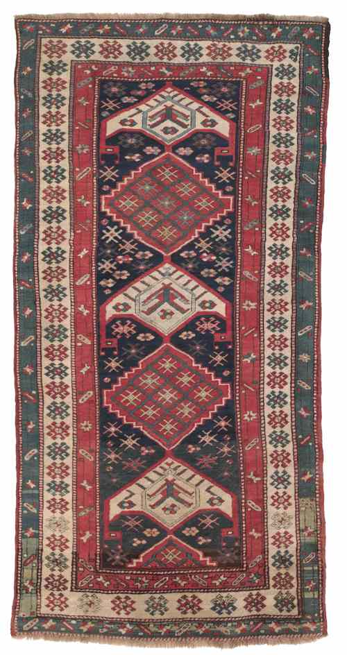 Appraisal: Kazak carpet early th c with central medallion and blue