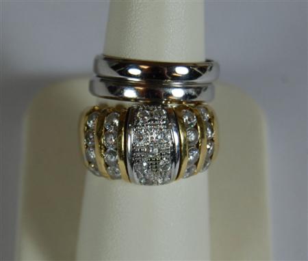 Appraisal: A pair of platinum wedding bands together with a colourless