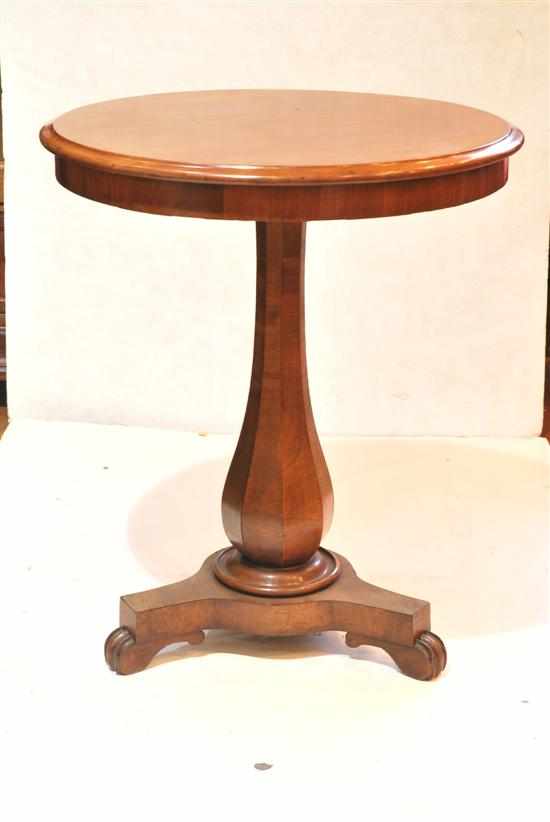 Appraisal: A th century mahogany wine table Circular with a facetted