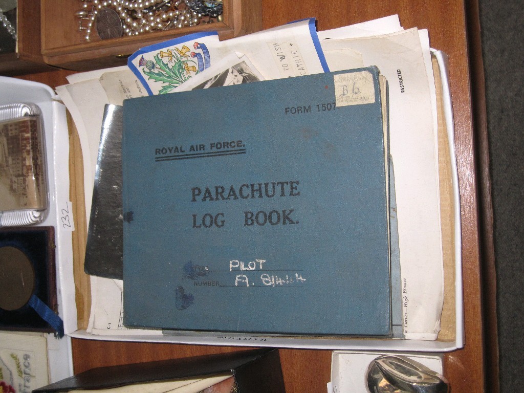 Appraisal: Lot comprising RAF parachute log book and other RAF ephemera