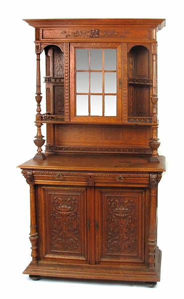 Appraisal: A Continental Renaissance Revival carved oak side cabinet fourth quarter