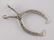 Appraisal: An unusual late Victorian silver clamp similar to a stonemason's