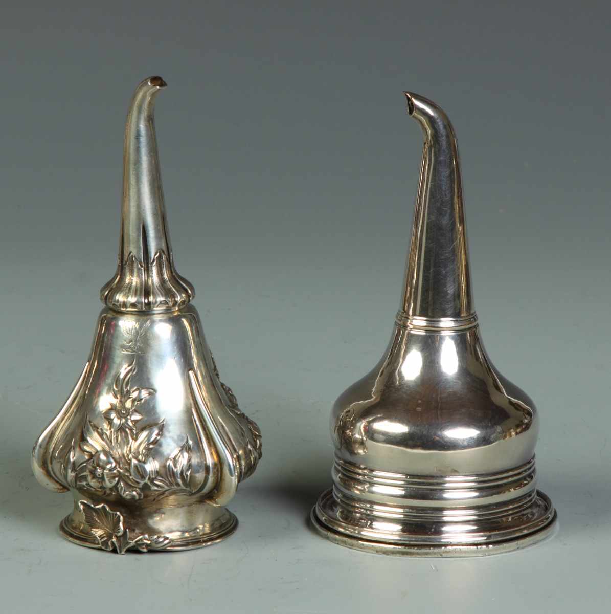 Appraisal: Silver Strainers Funnels Silver Strainers Funnels L sterling floral repousse