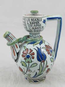 Appraisal: An Islamic style Cantigalli ceramic coffee pot and cover with