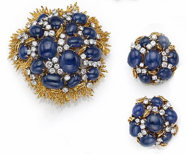 Appraisal: comprising a cluster brooch-pendant set with oval-shaped sapphire cabochons of