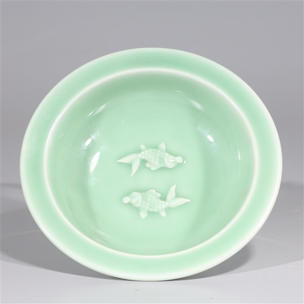 Appraisal: Chinese celadon glazed dish with goldfish in relief to interior