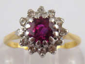 Appraisal: An carat yellow gold ruby and diamond cluster ring estimated