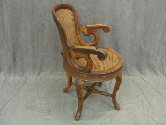 Appraisal: Victorian Caned Swivel Chair From a Larchmont home