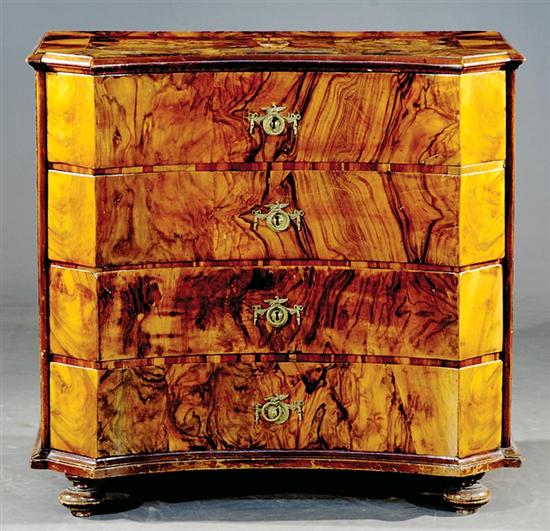 Appraisal: Continental walnut and marquetry concave front chest of drawers th