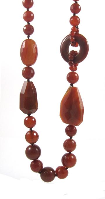 Appraisal: CARNELIAN AGATE BEAD NECKLACE measuring inches in length and strung