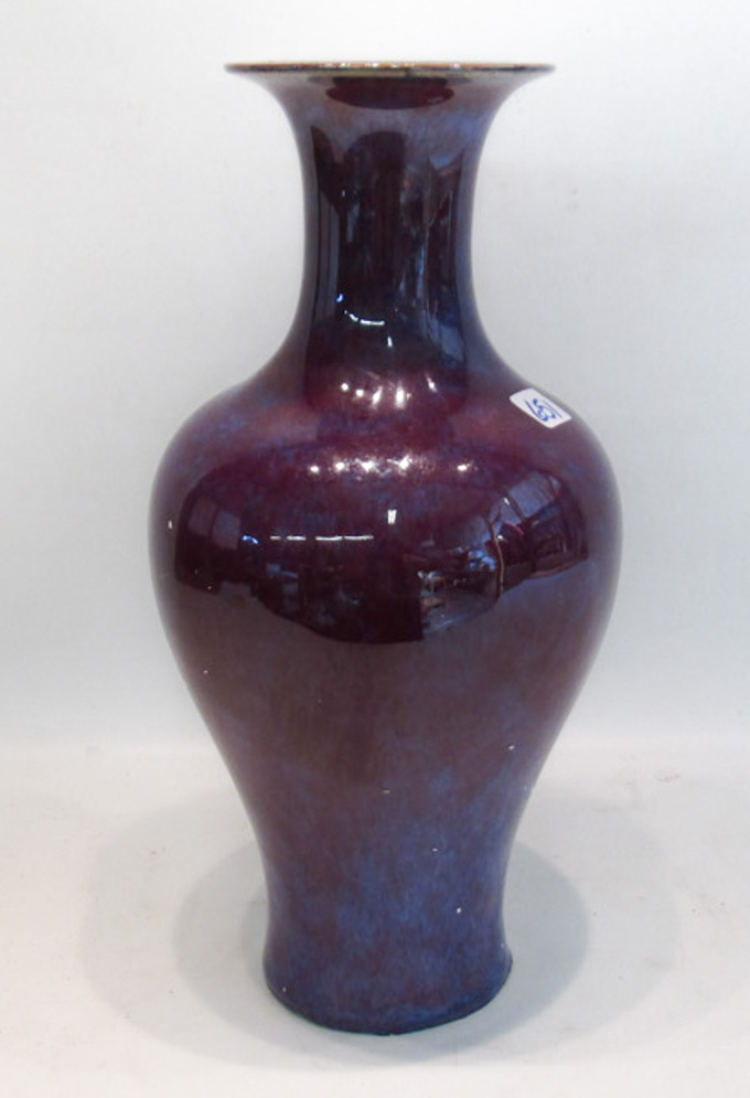 Appraisal: CHINESE FLAMBE GLAZED PORCELAIN VASE bottle form with variegated red