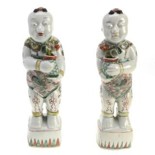 Appraisal: Pair Chinese famille vert Boys joss holders Pair Chinese famille