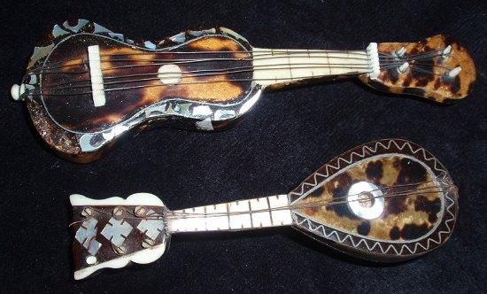 Appraisal: A miniature late th Century tortoiseshell mandolin together with a