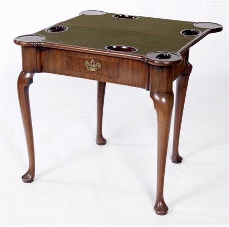 Appraisal: A Georgian mahogany foldover games table the rectangular top with