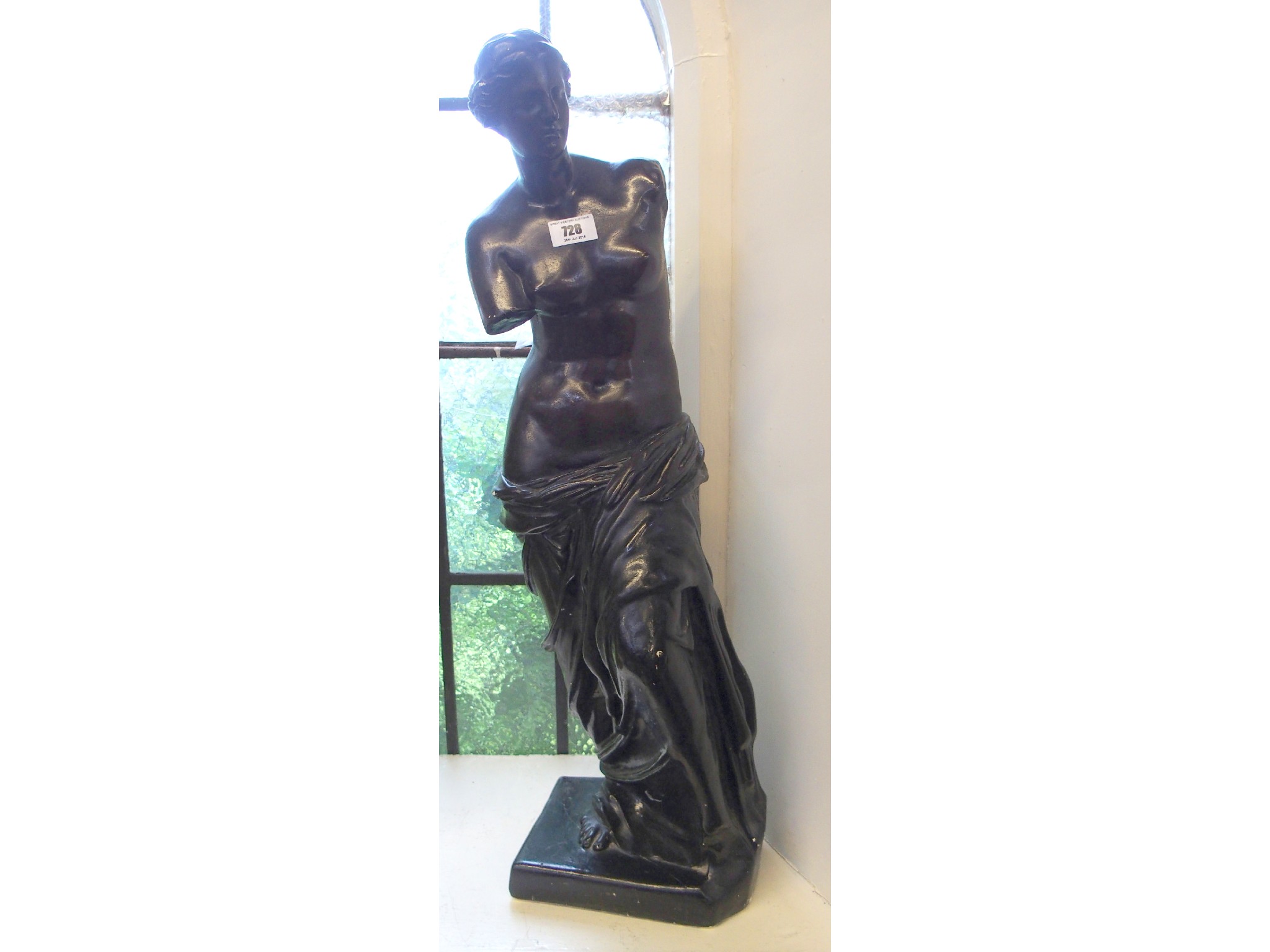 Appraisal: Black painted classical sculpture of a maiden