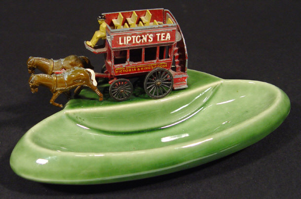 Appraisal: Wade porcelain ashtray surmounted with a Lesney Liptons Tea horse