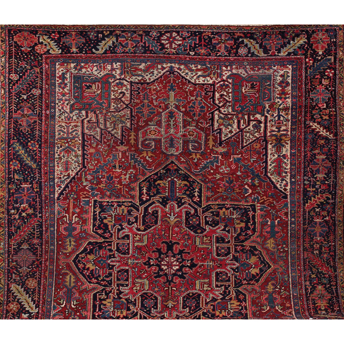 Appraisal: Heriz rug c stylized floral design on a red field