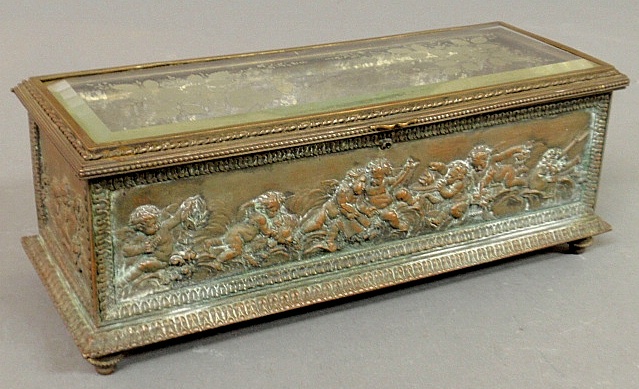 Appraisal: - Continental metal casket-form storage box c with raised relief