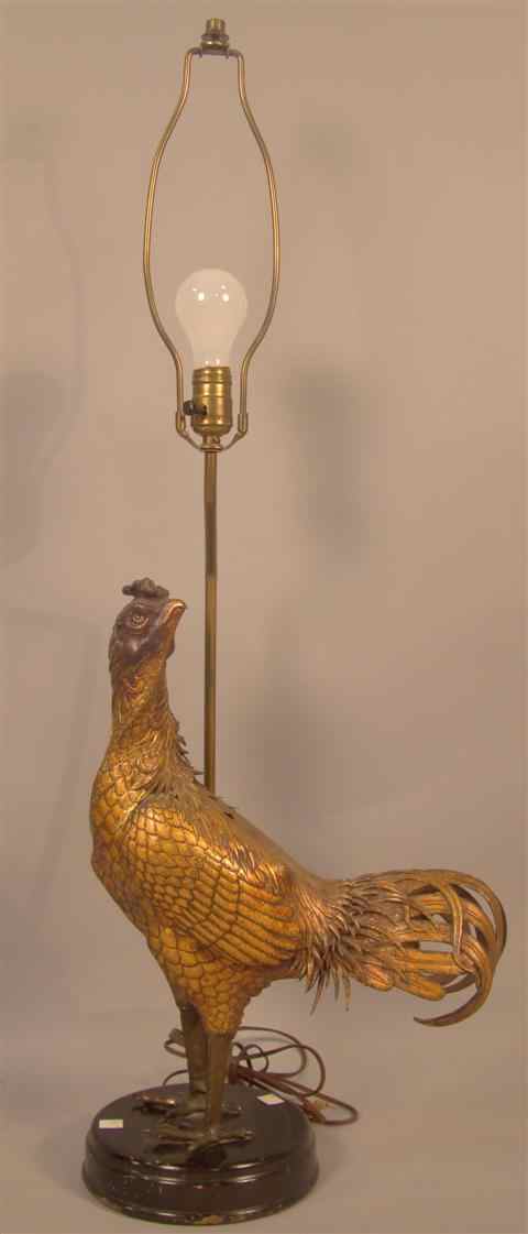 Appraisal: CONTINENTAL PAINTED METAL MODEL OF A GAME BIRD the gold