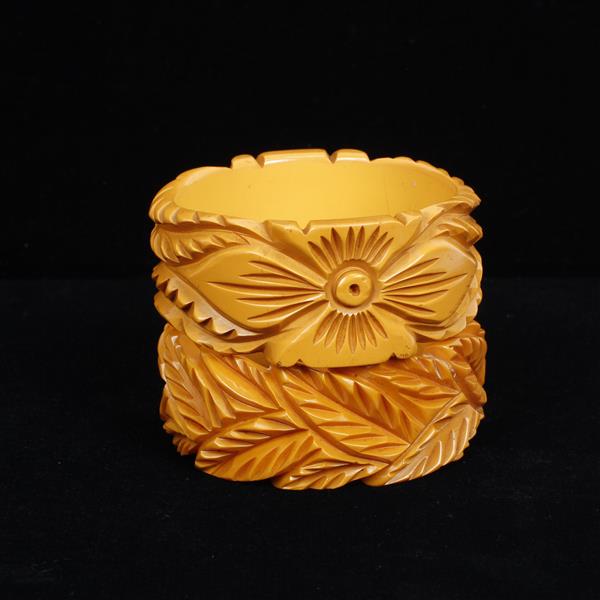 Appraisal: Two Wide Deep Carved Floral Bakelite Bangled Bracelets dia