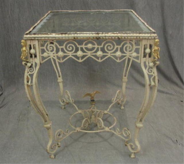 Appraisal: Metal Glass Top Table with Dore Bronze Figural Mounts and