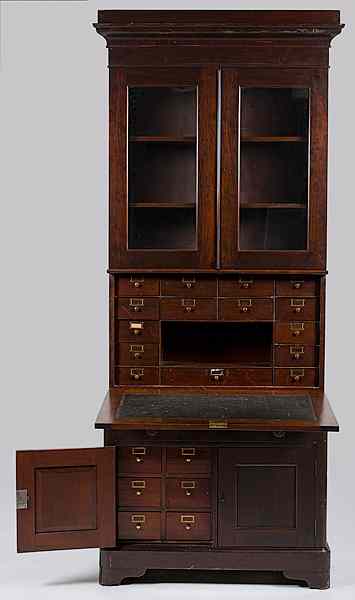 Appraisal: Postmanster's Secretary Bookcase American th century a Postmaster's secretary bookcase