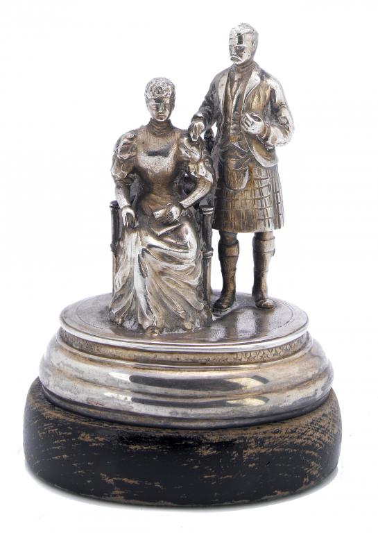 Appraisal: AN UNUSUAL VICTORIAN SILVER FIGURAL DESK WEIGHT AS A STATUETTE