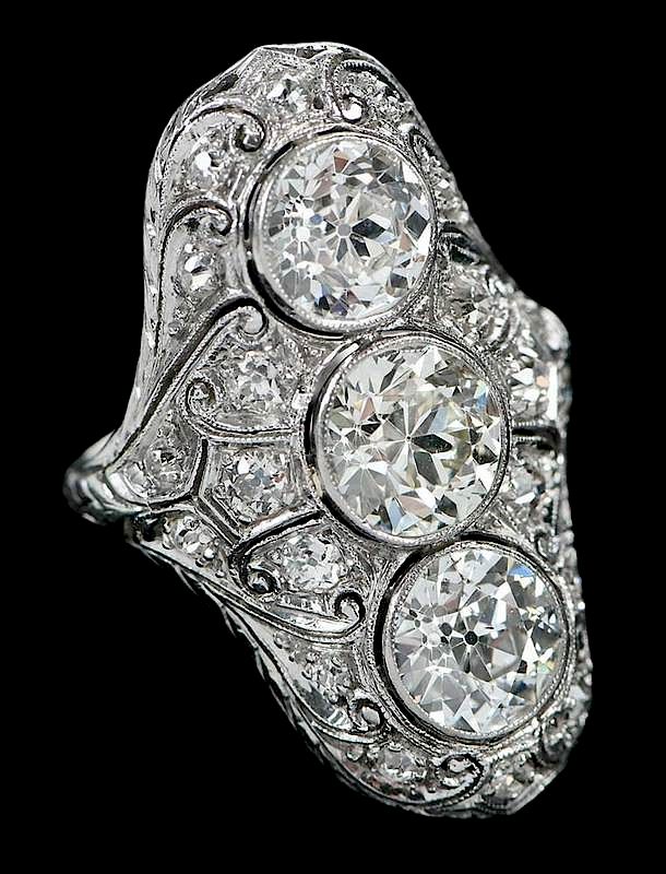 Appraisal: Antique Platinum and Diamond Ring three center diamonds estimated weight