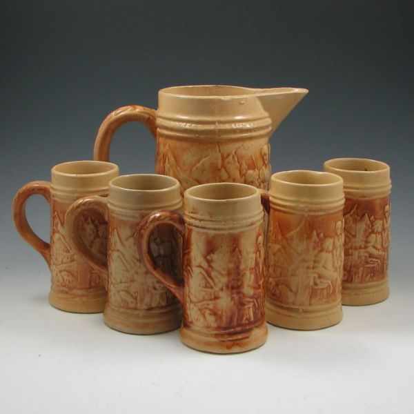 Appraisal: Hull early stoneware pitcher and five steins All are marked