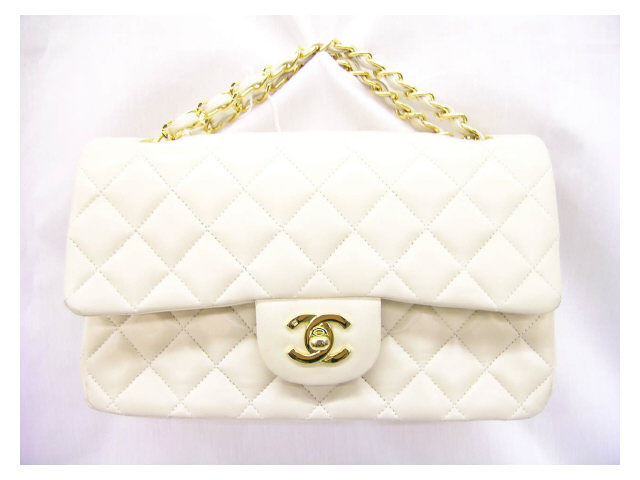 Appraisal: Chanel handbag quilted ivory leather handbag registration card and cleaning