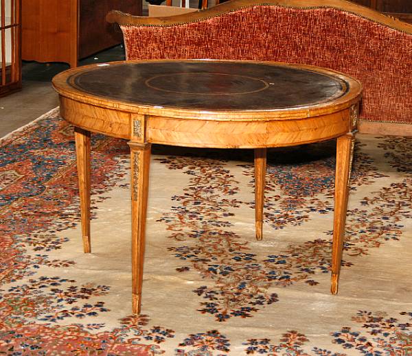 Appraisal: A Louis XVI leather inlaid kingwood center table restoration and